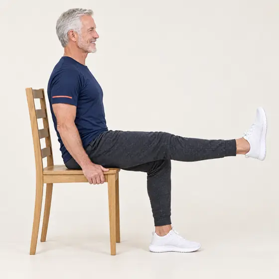 Knee Extension: Sit tall, hold the sides of the seat.