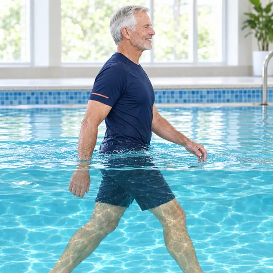 Water Walking: Stand tall in waist-deep water.
