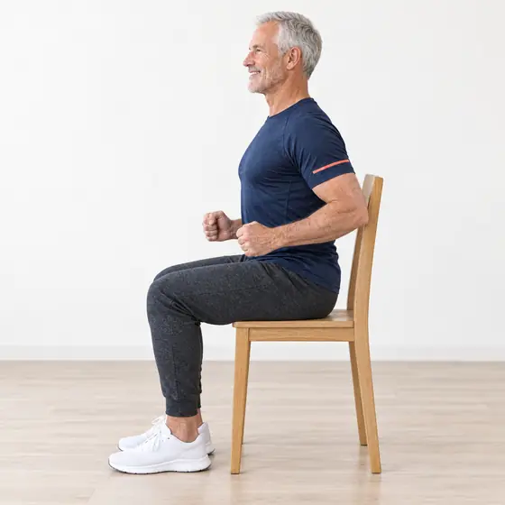 Shoulder Blade Squeeze: Sit tall, elbows bent at your sides.