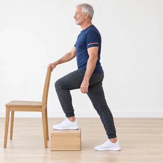 Step-Ups: Stand in front of a low step, a hand on a rail or the chair.