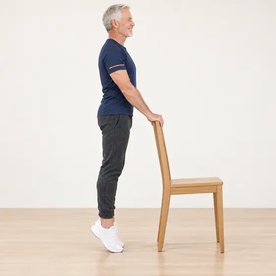 Calf Raises: Hold the chair back, feet hip-width apart.