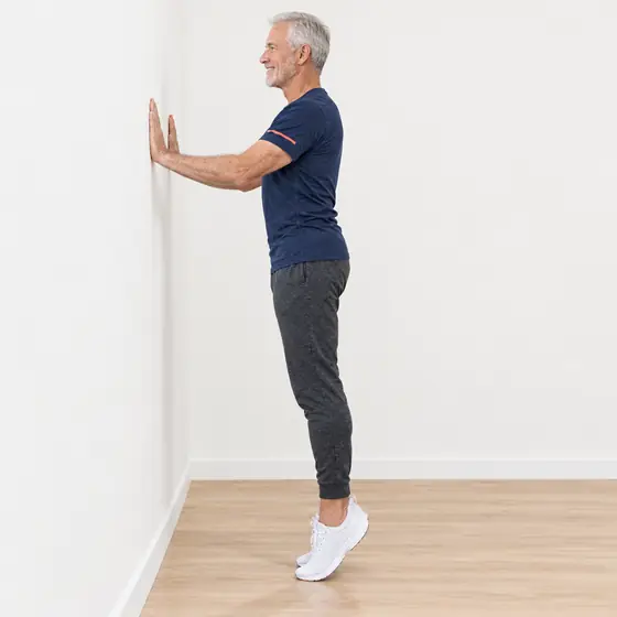Wall Heel Raises: Face the wall, hands resting on it at shoulder height.